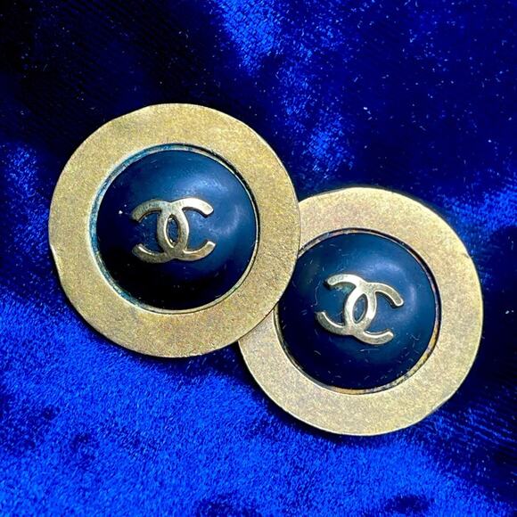 Chanel brass clip on earrings with black center and double CC
